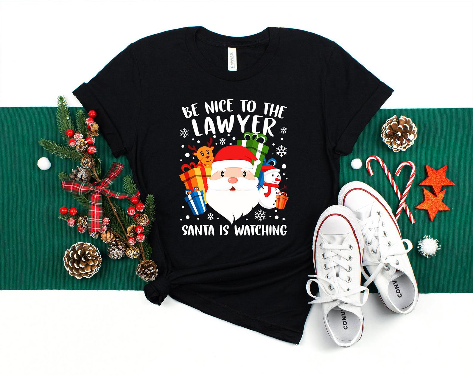 Lawyer Christmas Shirt Be Nice To The Lawyer Santa Is Watching Shirt Funny Lawyer T Shirt Black Unisex S-6XL